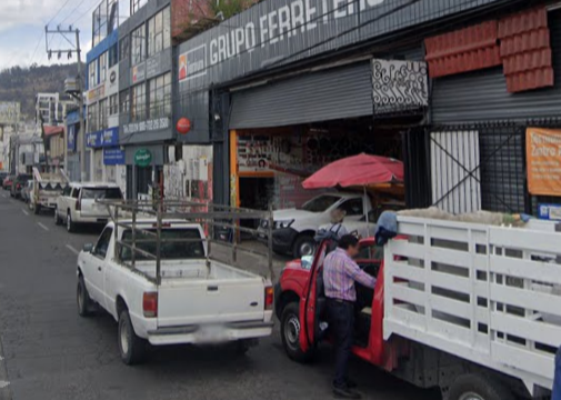 Camionetas en doble fila